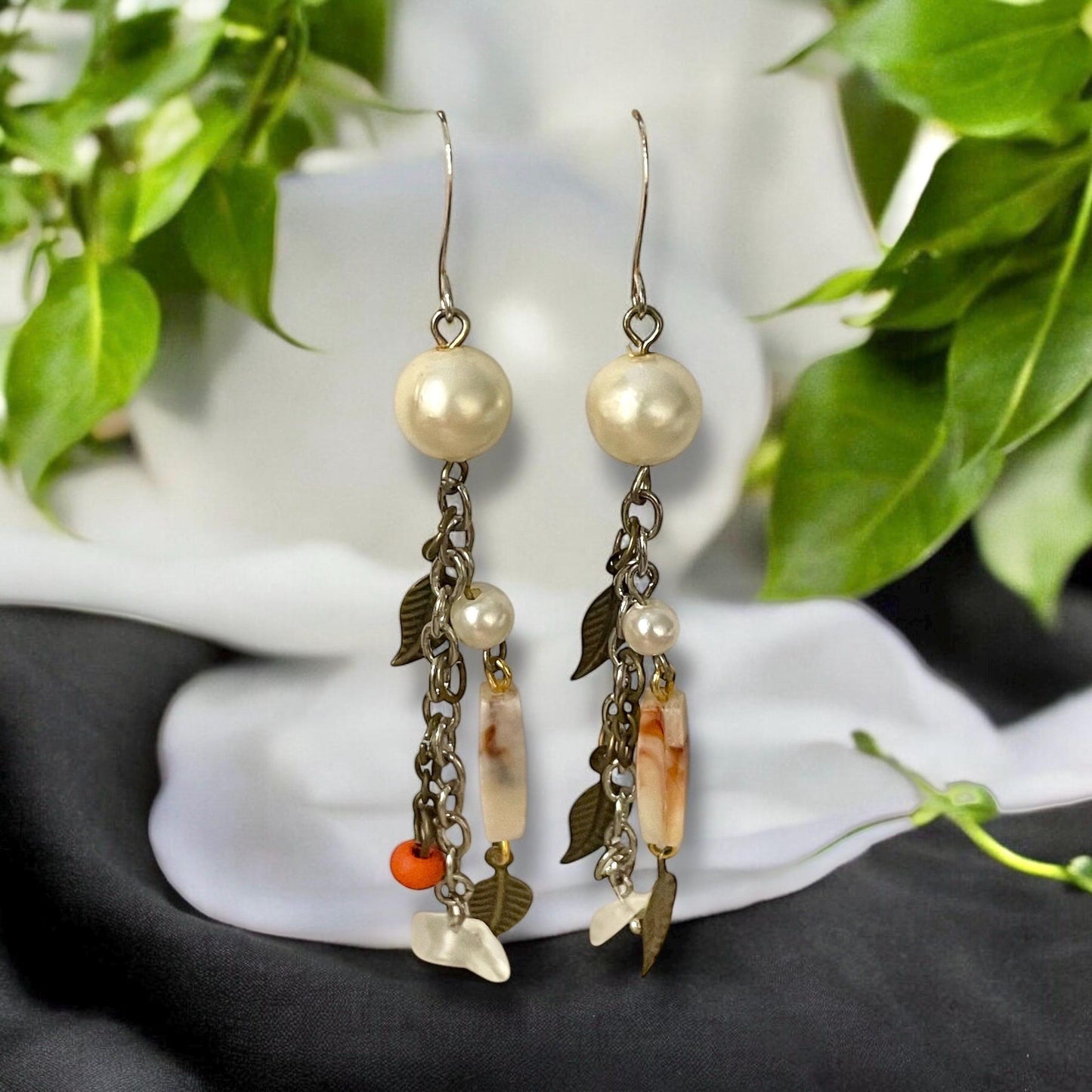 Collage inspired earrings - mixed materials including vintage metal leaves, orange wood, chain, faux pearls and ivory faux bone spacers