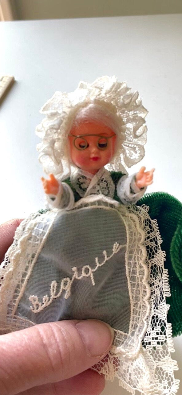 Stunning vintage collectible art baby Doll from Belgium with green velvet dress and lace overlay