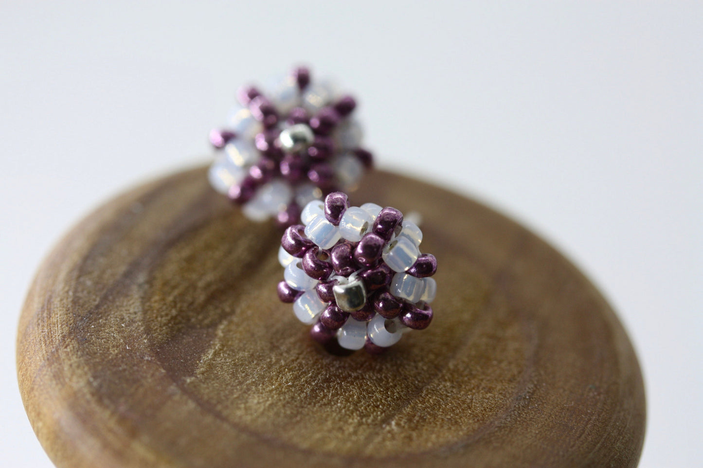 Hand beaded sterling silver stud earrings - purple with drops of gold lined white glass - studs, beadwork studs, beaded studs