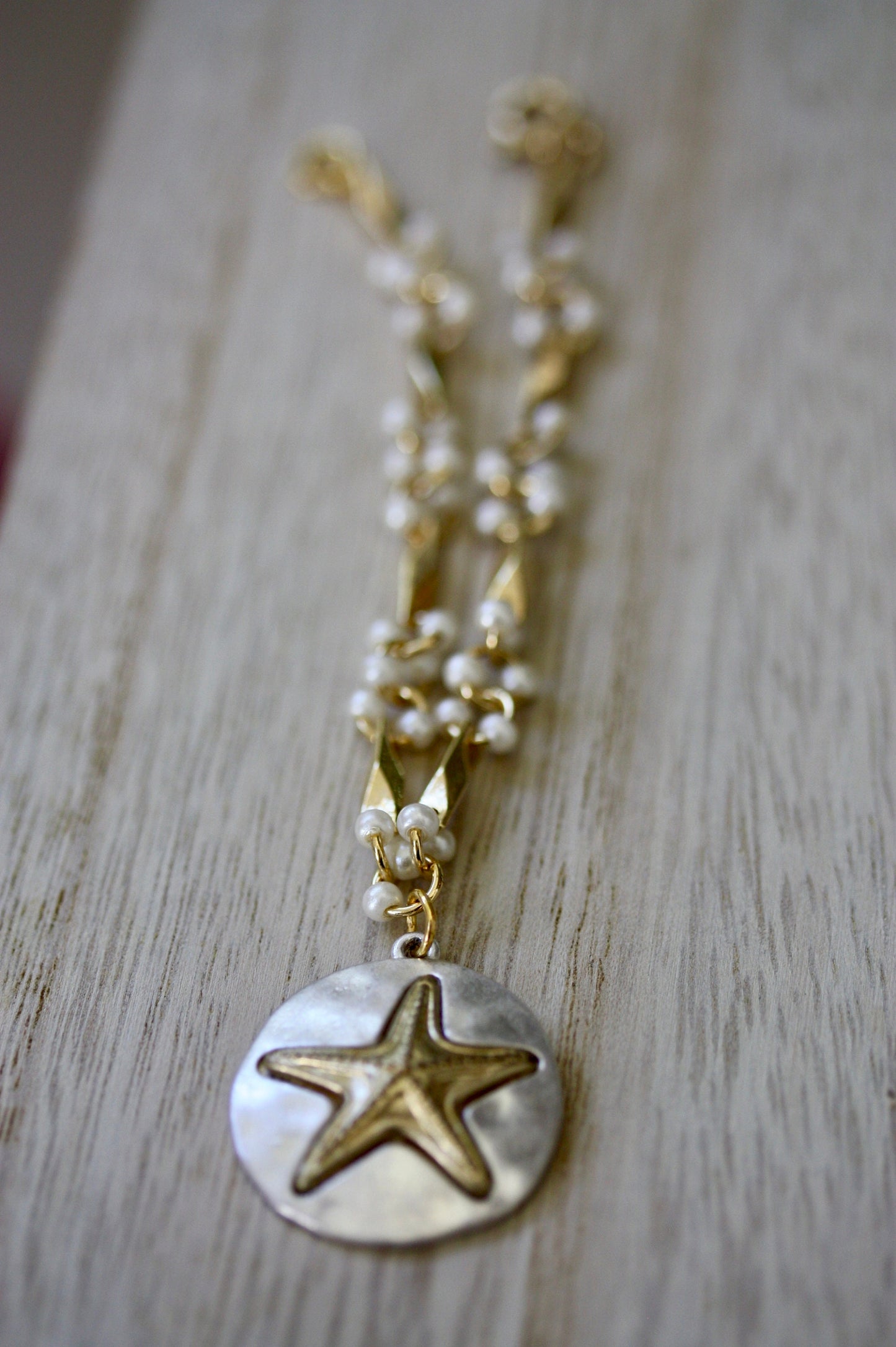 Handmade bracelet made with upcycled / repurposed vintage silver tone and gold tone starfish dangle, charm bracelet