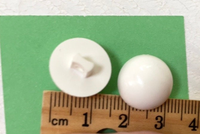 Lot of white domed top vintage buttons