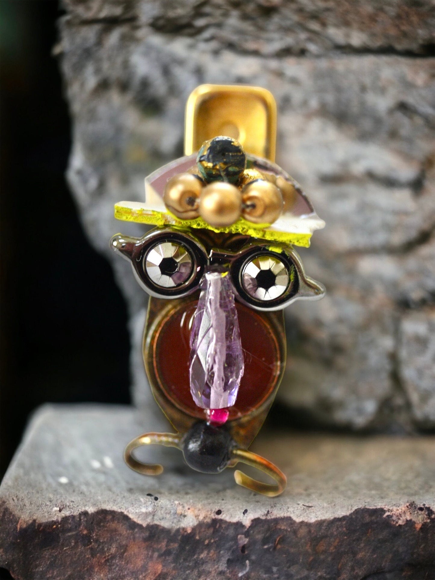 Meet "Henrietta."  Henrietta is a really cool assemblage art gal who can be transformed into a necklace, pin, magnet, bottle or little dish