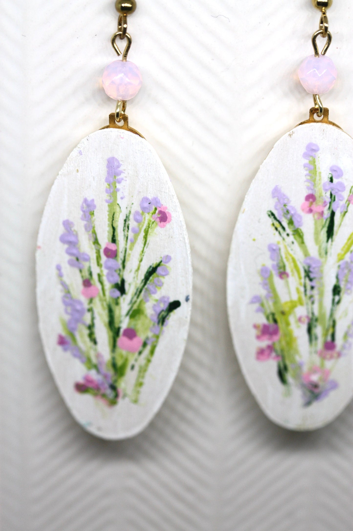 My original handpainted oval wood earrings with bead trim