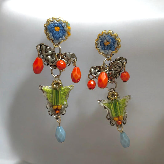 Handmade mixed media earrings made with embroidery from a vintage linen table runner, combined with glass, plastic, metal & fabric elements
