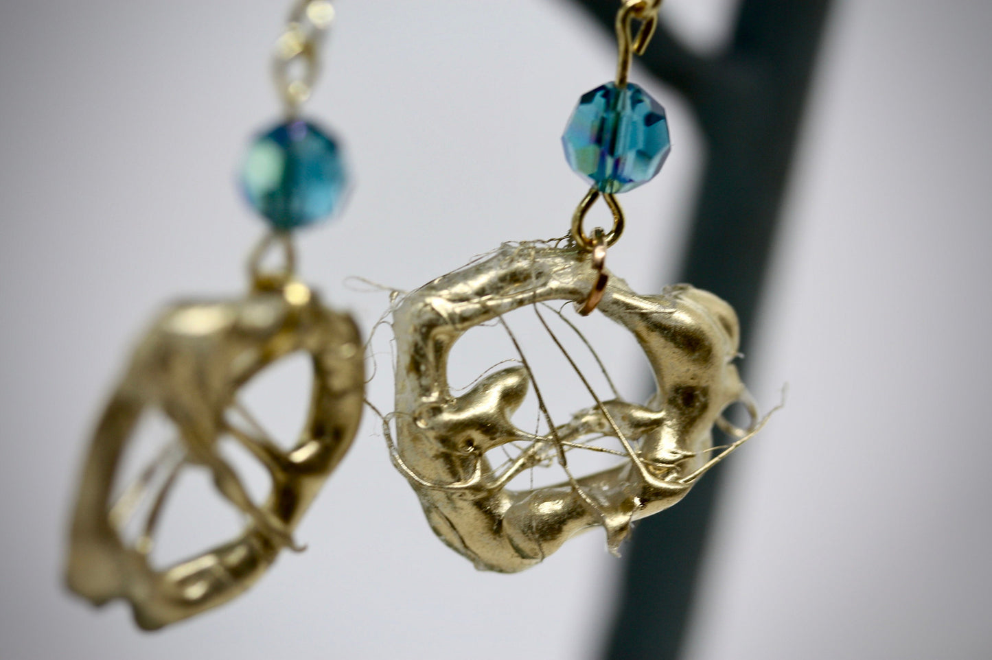 Lightweight faux metal unique free form handmade goldtone dangle earrings with AB blue crystals