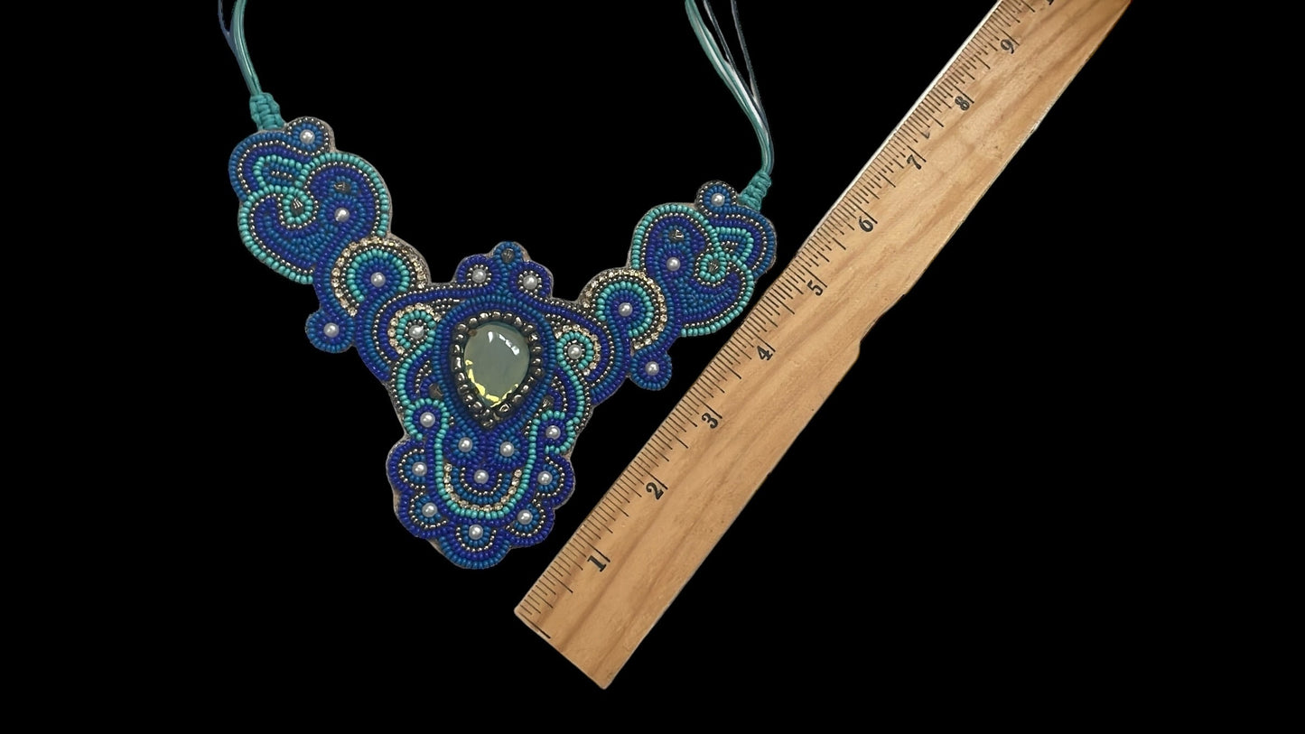 Stunning beadwork necklace with velvet felt backing
