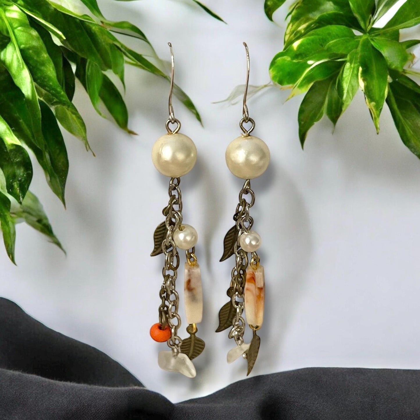 Collage inspired earrings - mixed materials including vintage metal leaves, orange wood, chain, faux pearls and ivory faux bone spacers