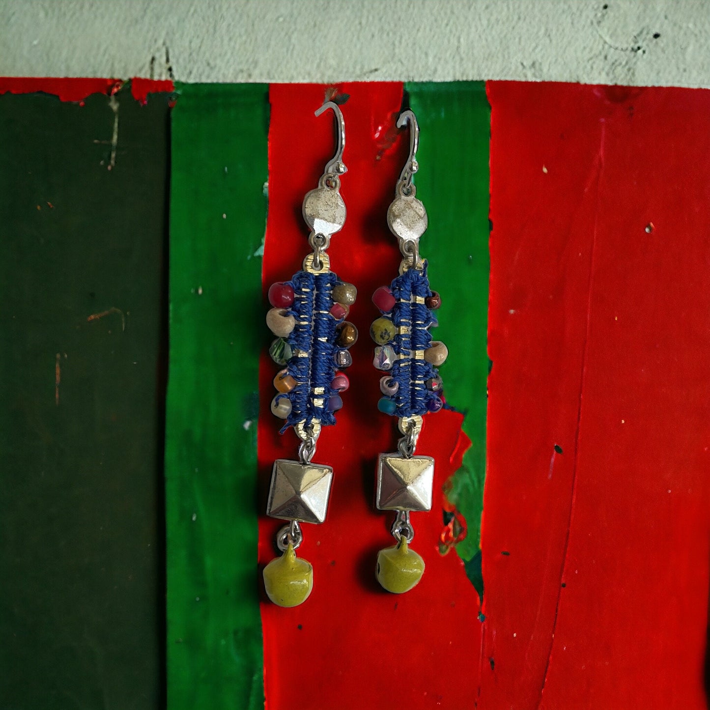Mixed material collage earrings - metal, string, glass, and mustard yellow tiny bells