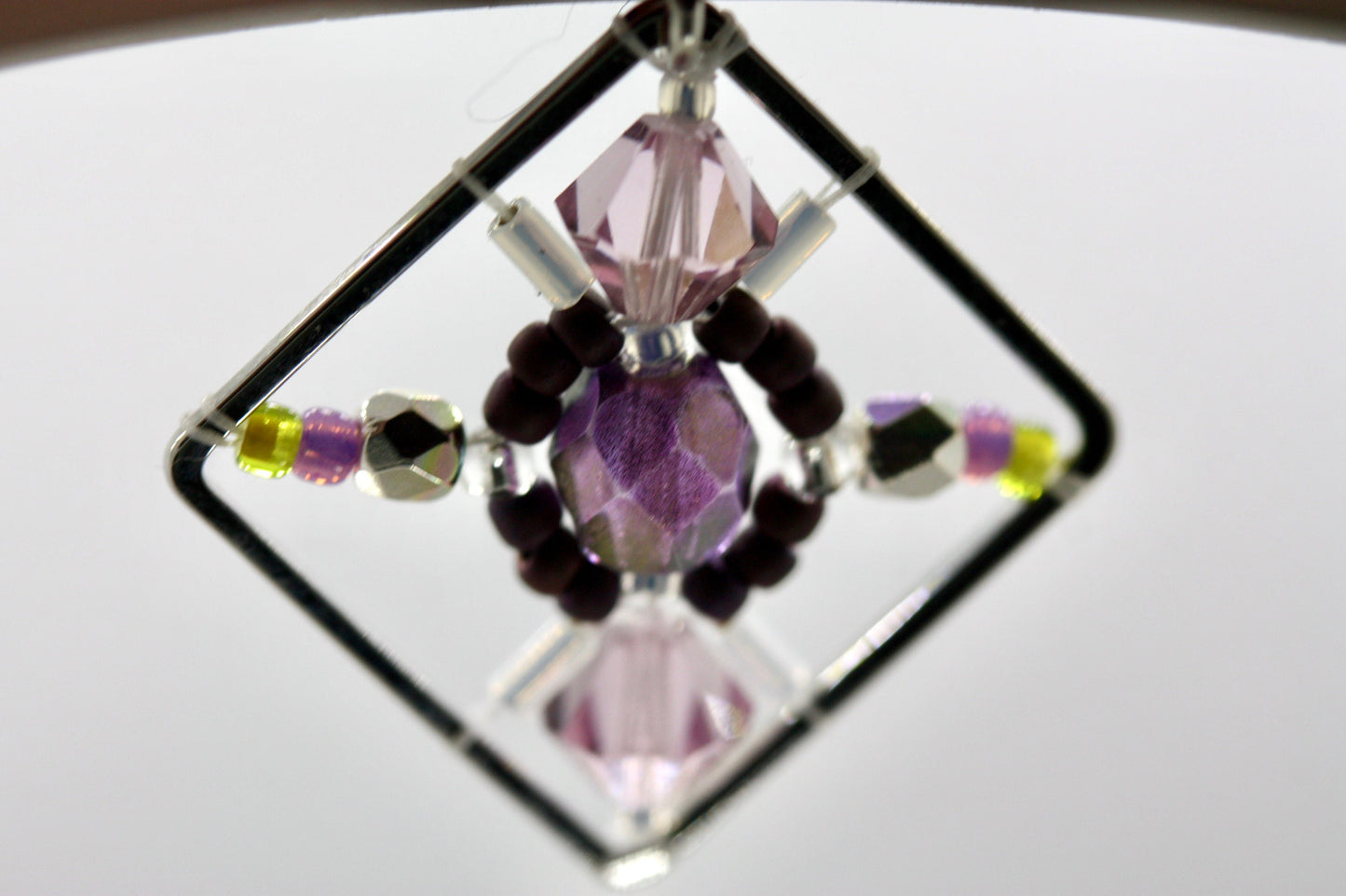 Purple, green and pink crystal and intricate beadwork small square dangle earrings