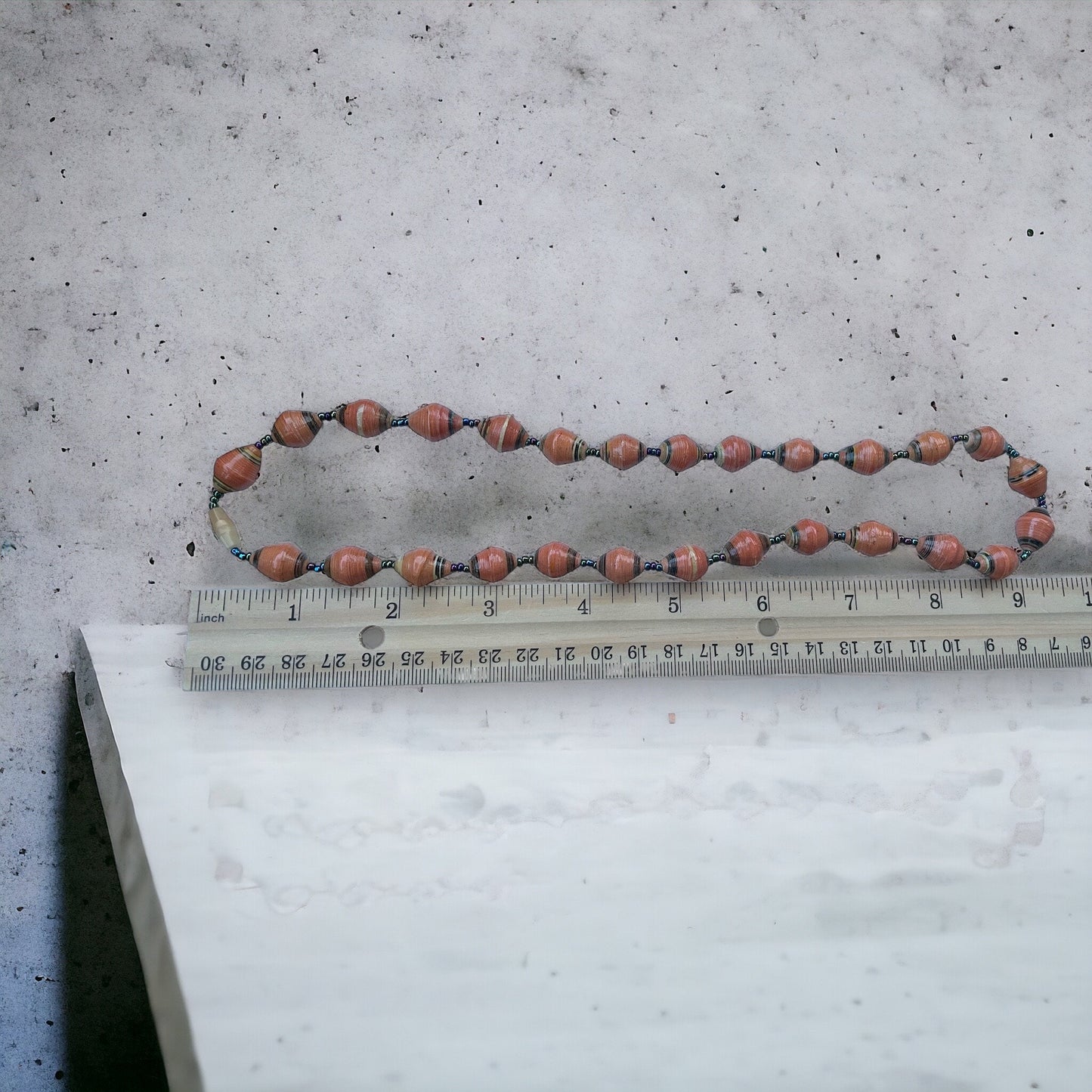 Orange paper rolled oval beaded necklace