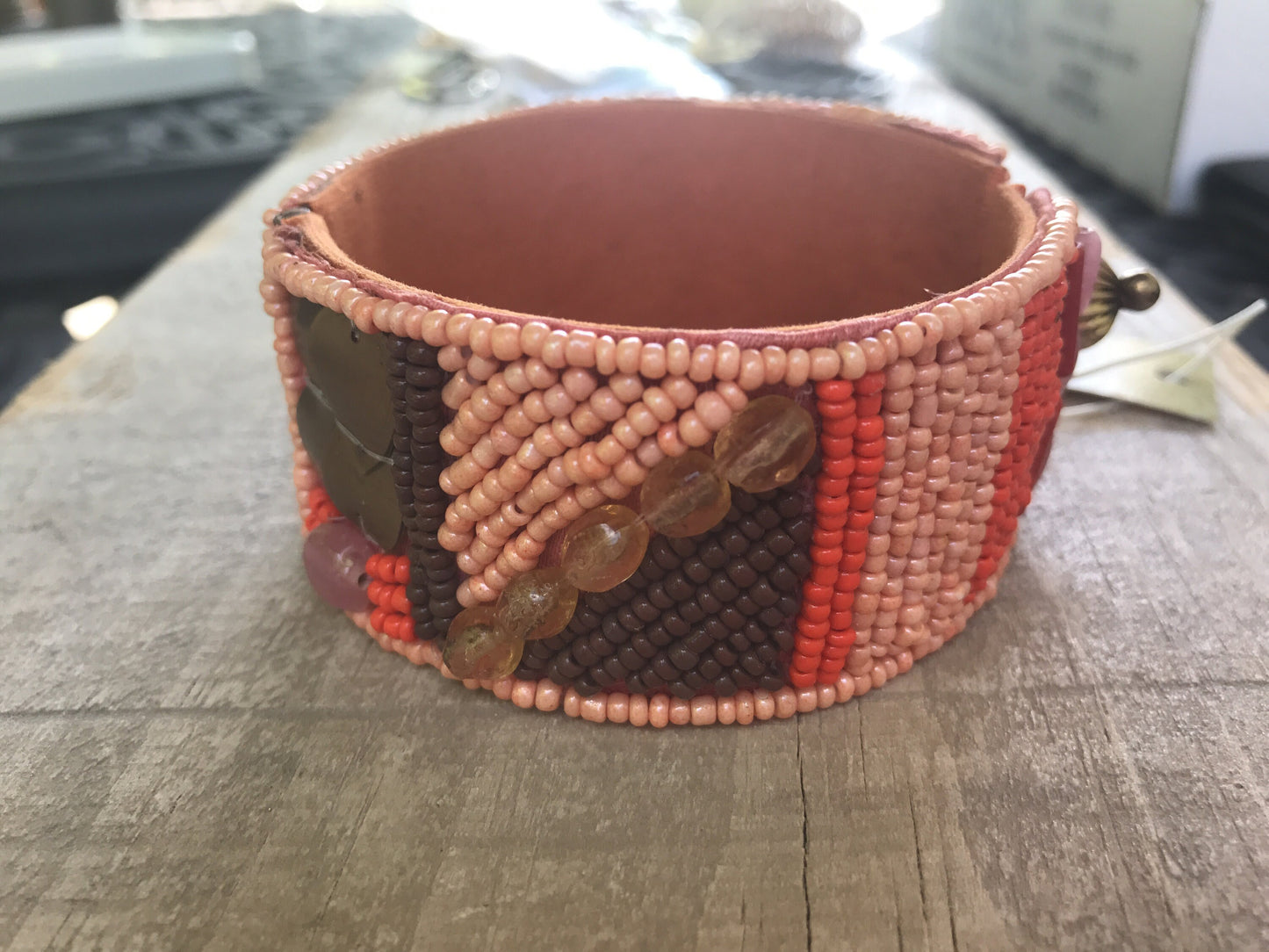 Stunning and unique vintage seed bead and mixed material vintage bracelet - shades of orange and brown - made by Sally C
