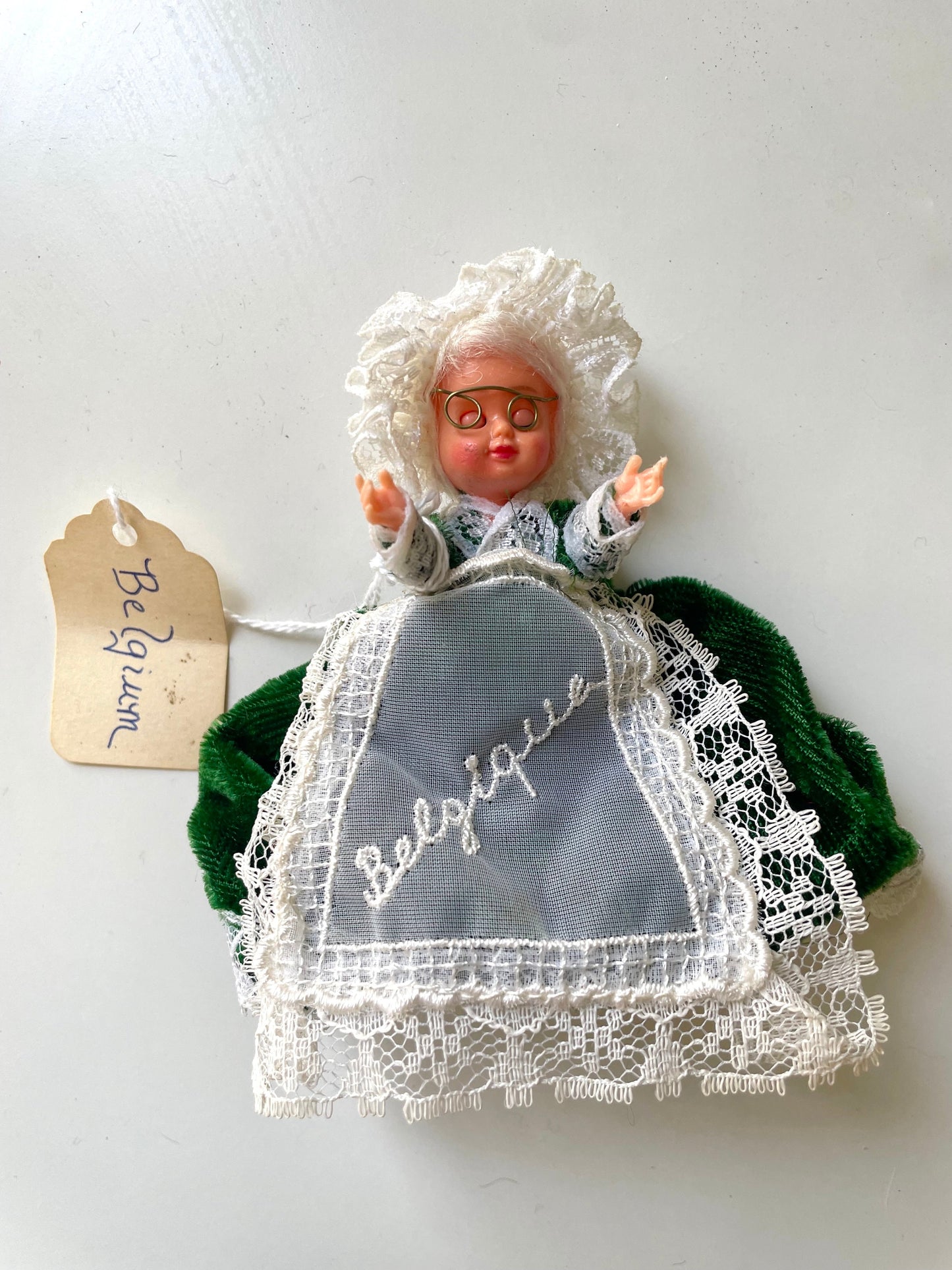 Stunning vintage collectible art baby Doll from Belgium with green velvet dress and lace overlay