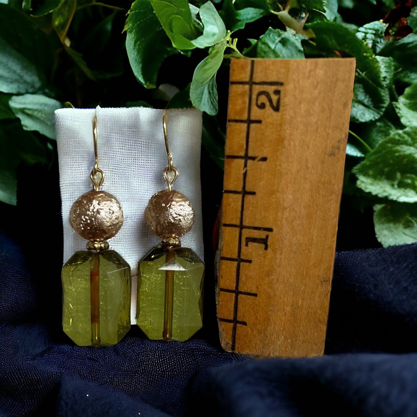 Clear green bevel and goldtone beaded dangle earrings