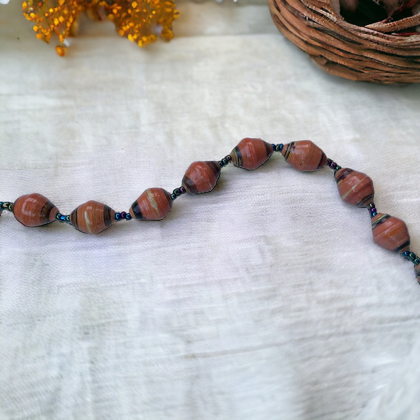 Orange paper rolled oval beaded necklace