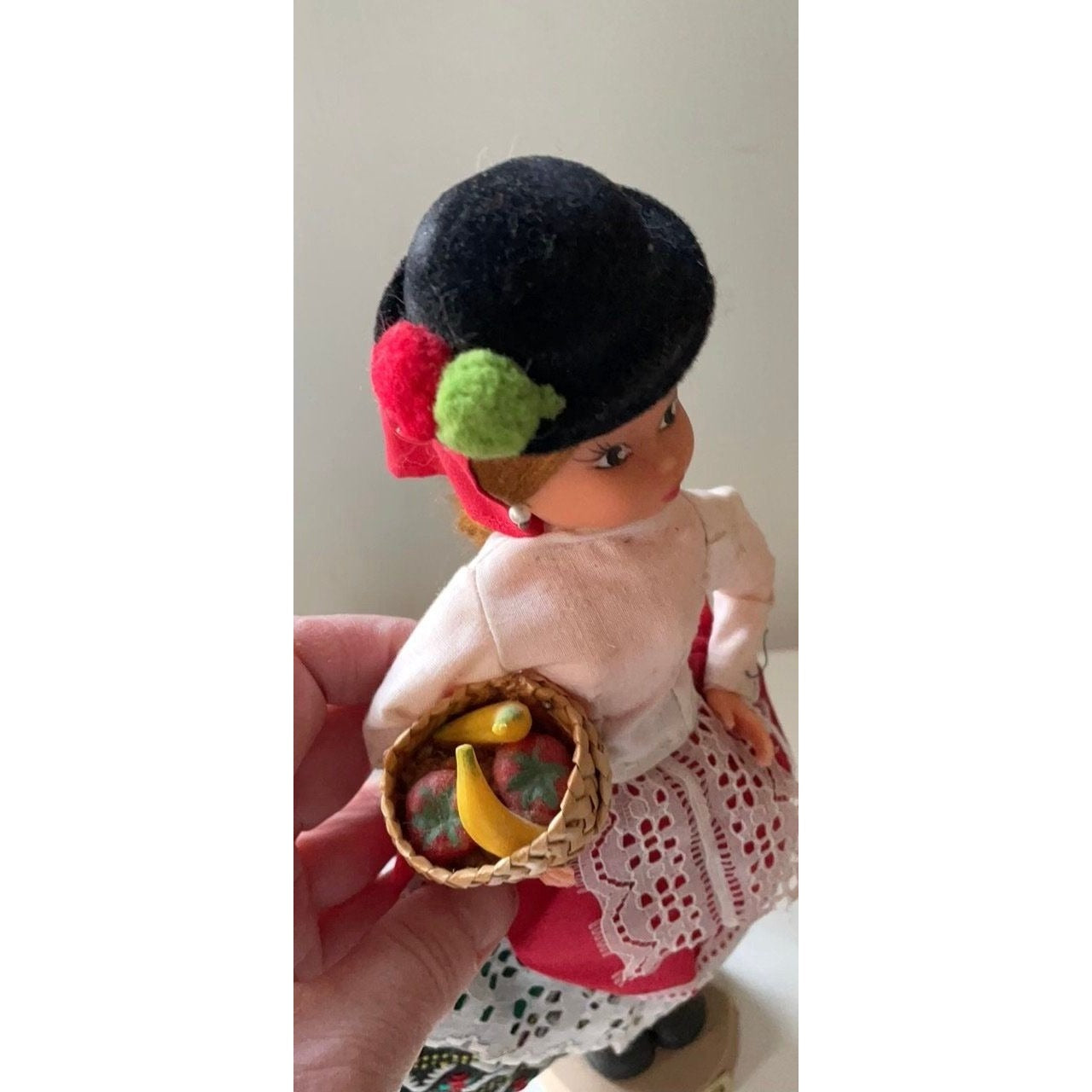 Vintage signed Muneca Artesana Beibi doll figurine - Made in Spain - holding wicker basket with miniature fruit