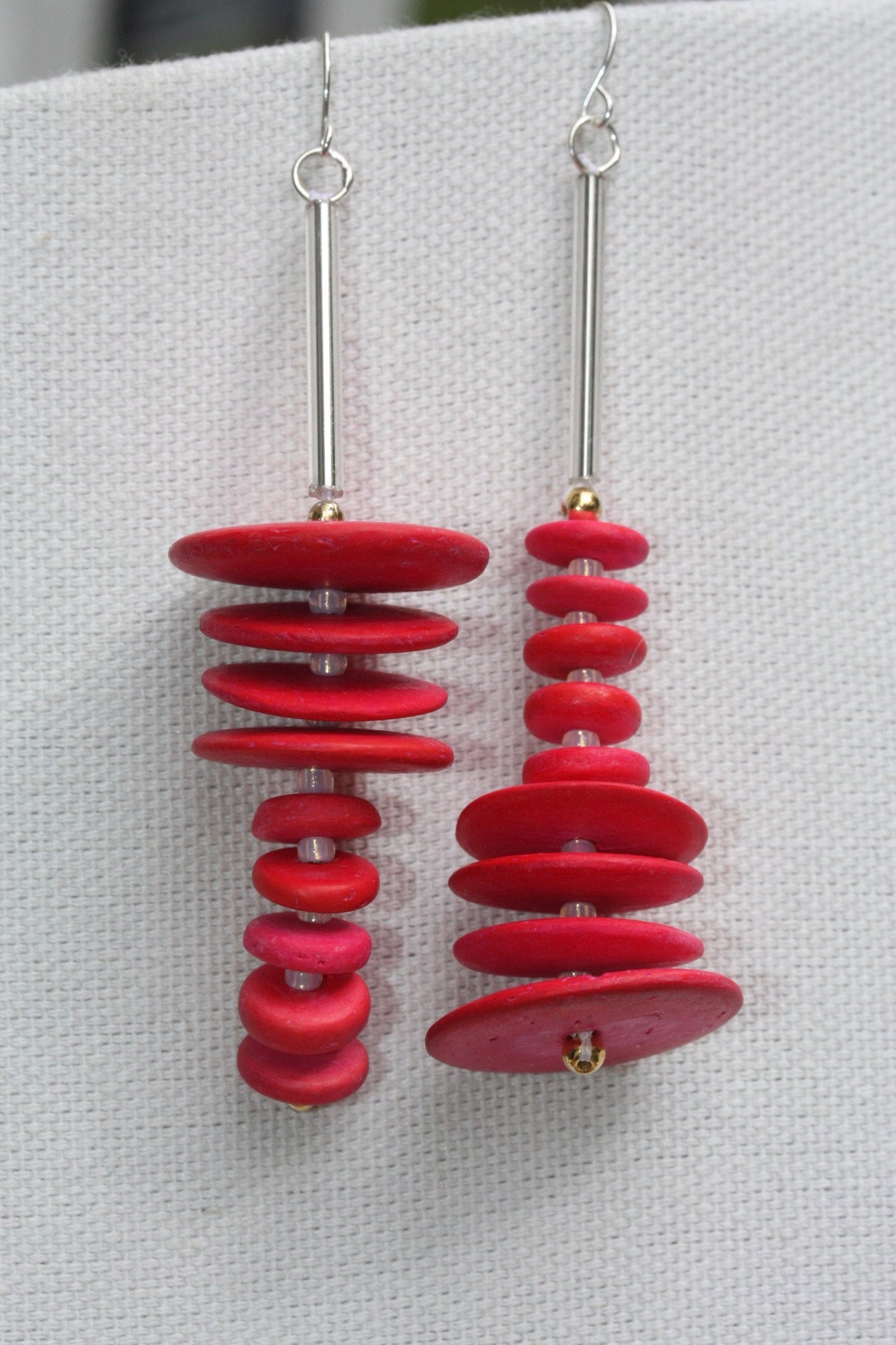Unique, hand beaded reddish pink wood heishi beads - fun statement earrings