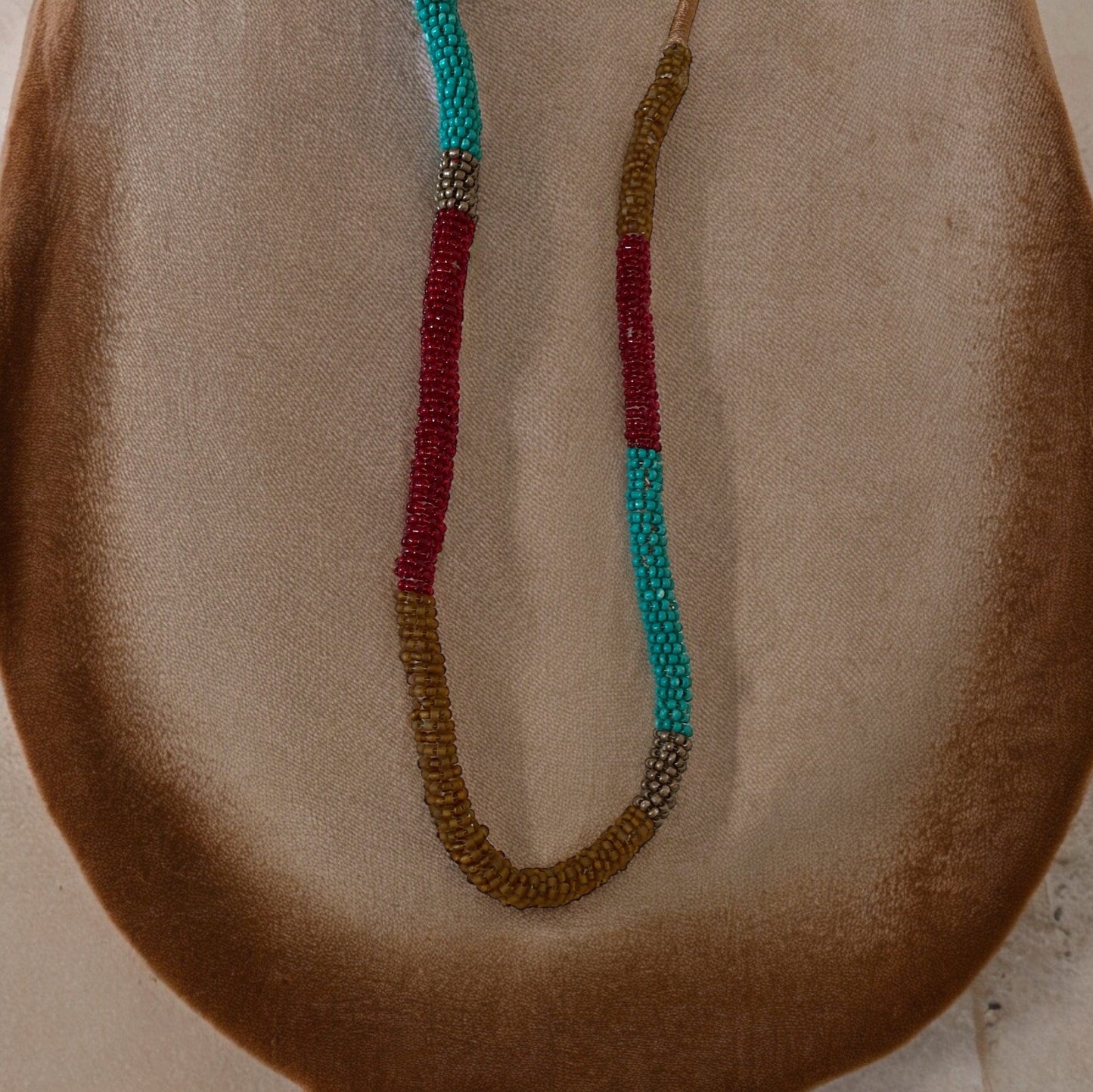 Stunning silk wrapped earth tone beaded long vintage necklace