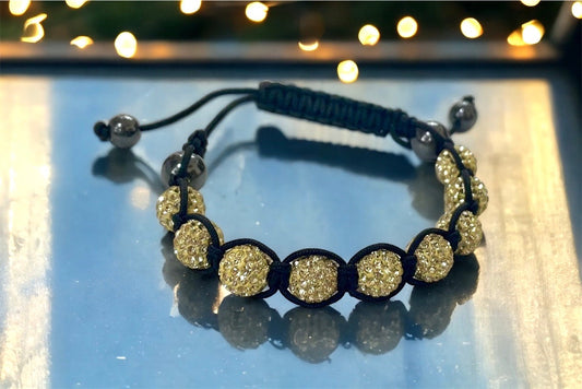 Sparkly black and yellow goldtone bracelet with hematite beads - adjustable