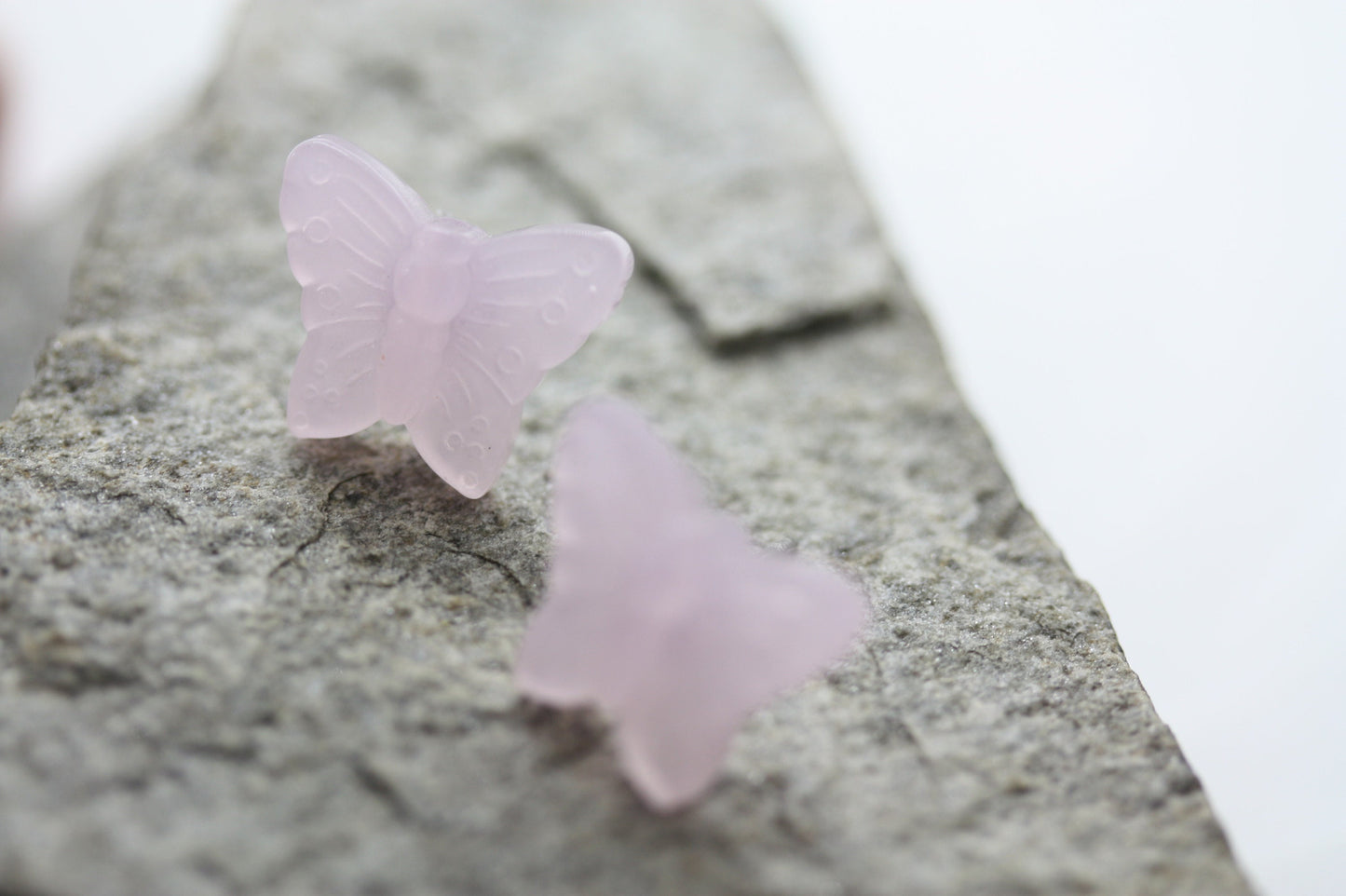 Small little light pink butterfly stud earrings