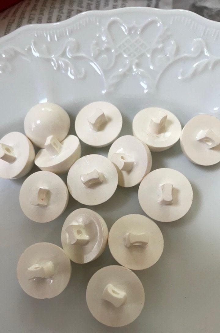 Lot of white domed top vintage buttons