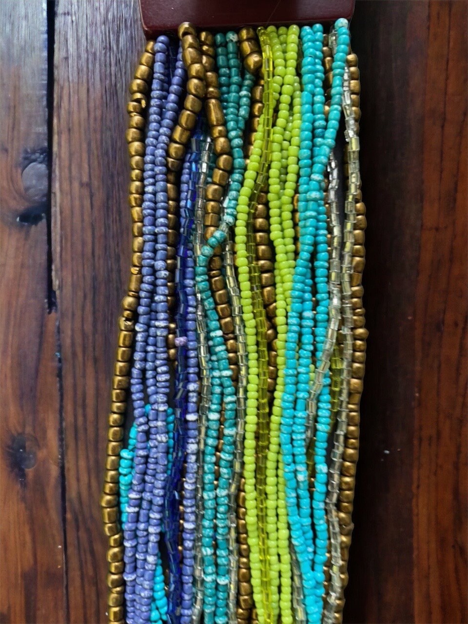 Stunning vintage bracelet - loaded with dozens of strands of tiny glass beads - plastic or bakelite closure?