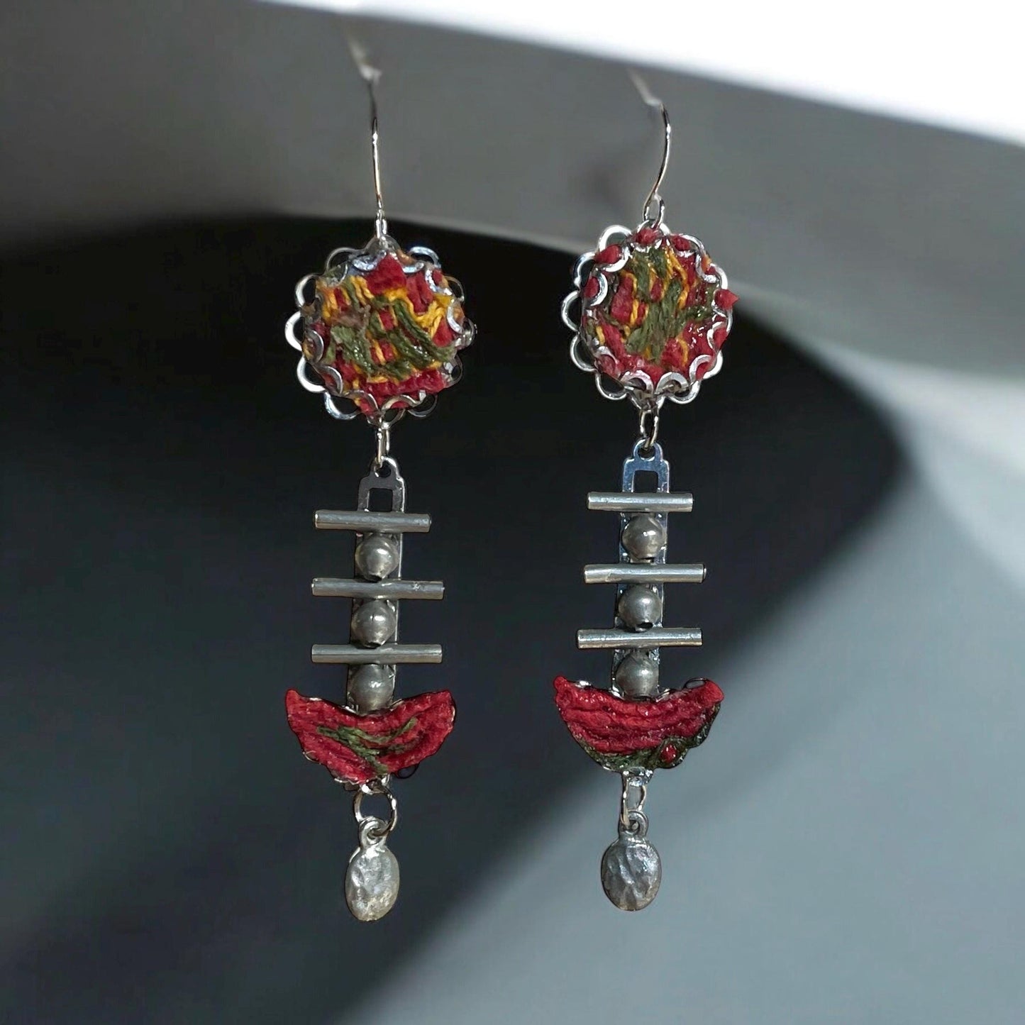 Red, yellow and olive green mixed media collage earrings with fabric, thread, mixed metals and hammered drops; Sterling silver ear wires
