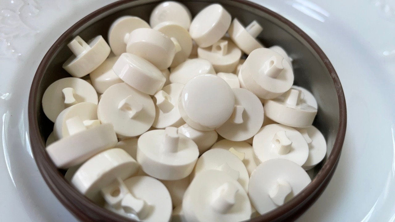 One dozen white round "puff" style cute vintage buttons