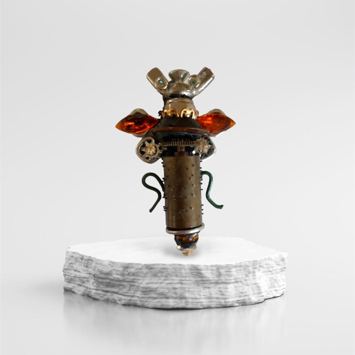 Meet "Scout" , a mixed material insect made of parts of a vintage Swiss music box, along with nails, screws, bolts - pin or necklace pendant