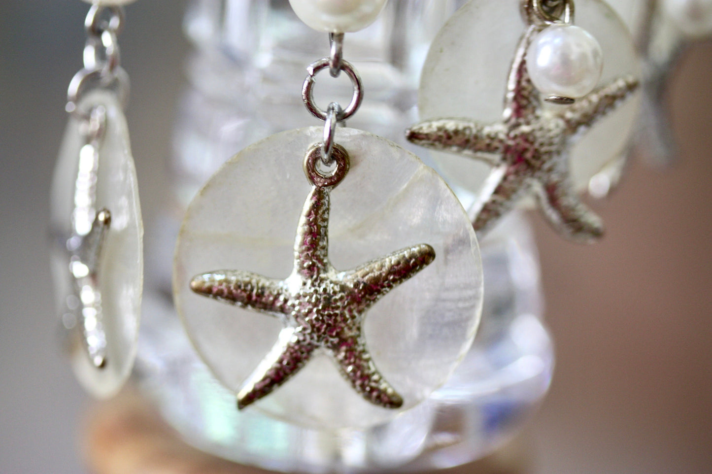 Capiz shell, faux pearl and silvertone starfish beach themed dangle earrings