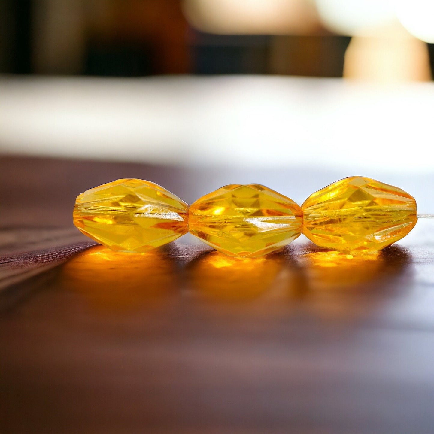 Orange oval faceted vintage beads - approx. 15 mm