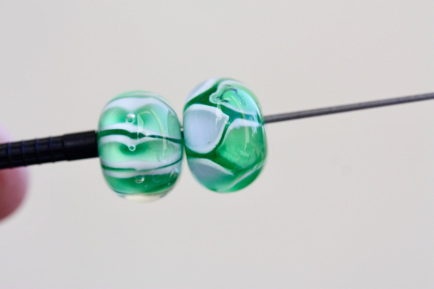 Two stunning vintage glass beads - shades of green and white
