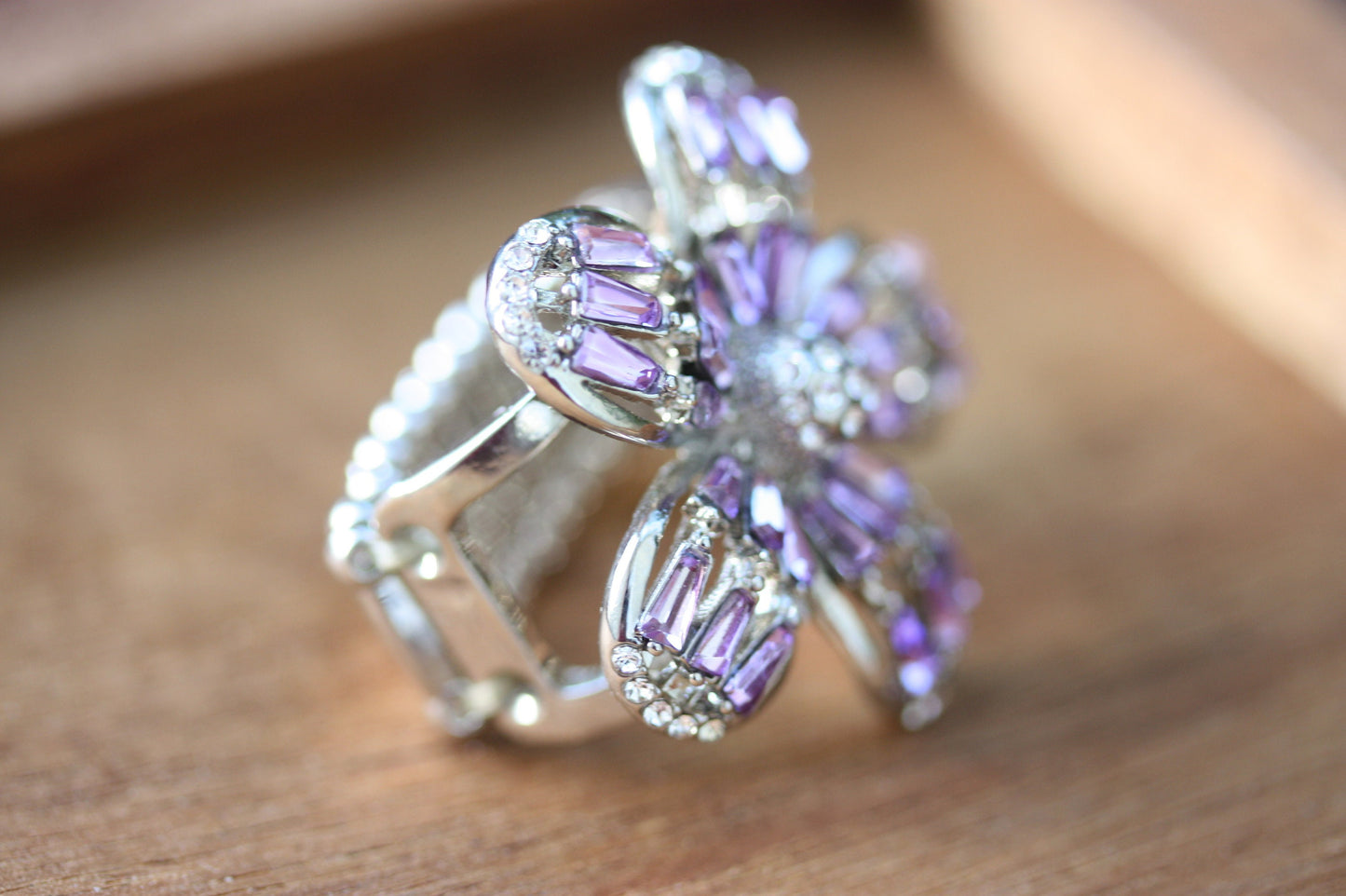Stunning and unique vintage clear rhinestones and purple baguettes flower ring