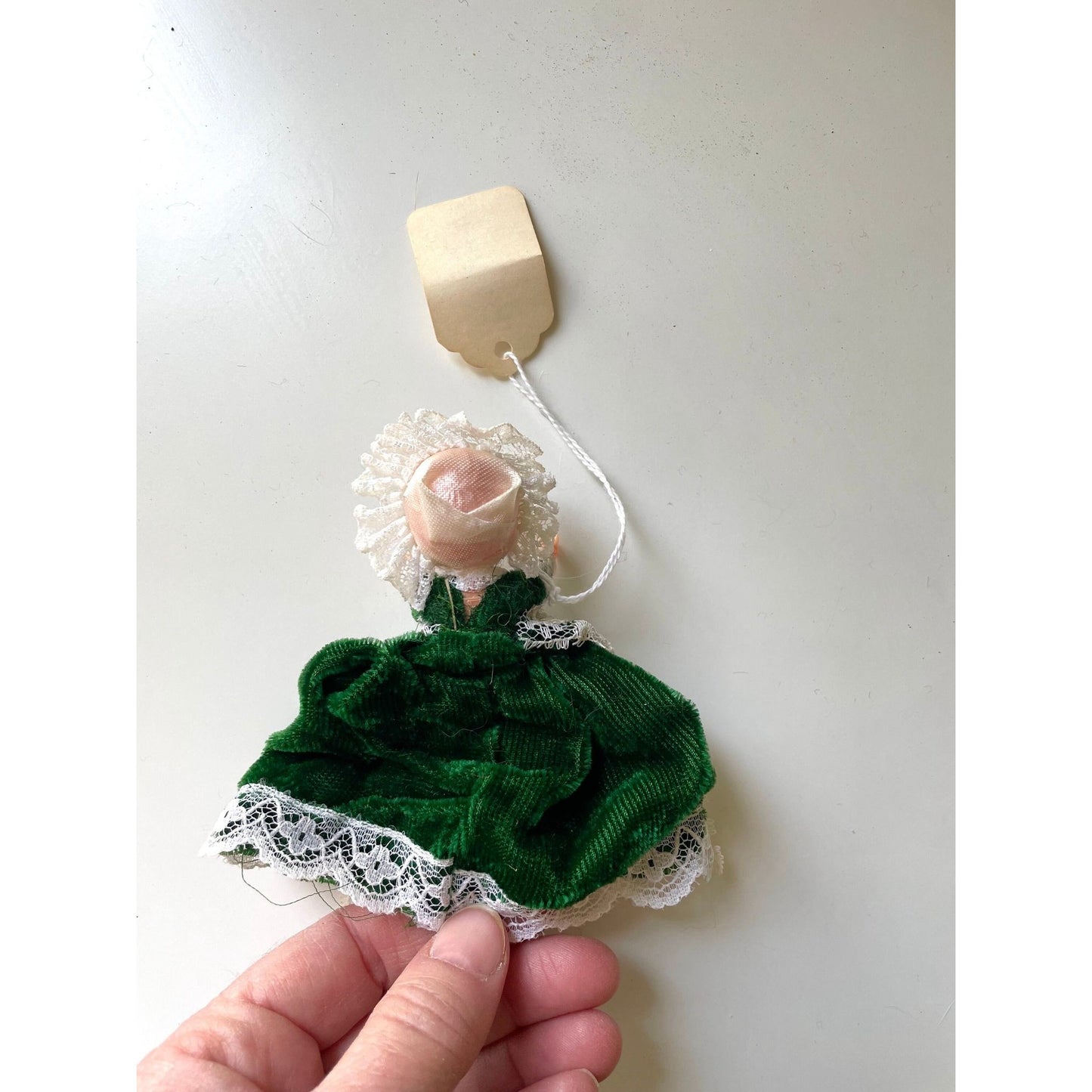 Stunning vintage collectible art baby Doll from Belgium with green velvet dress and lace overlay