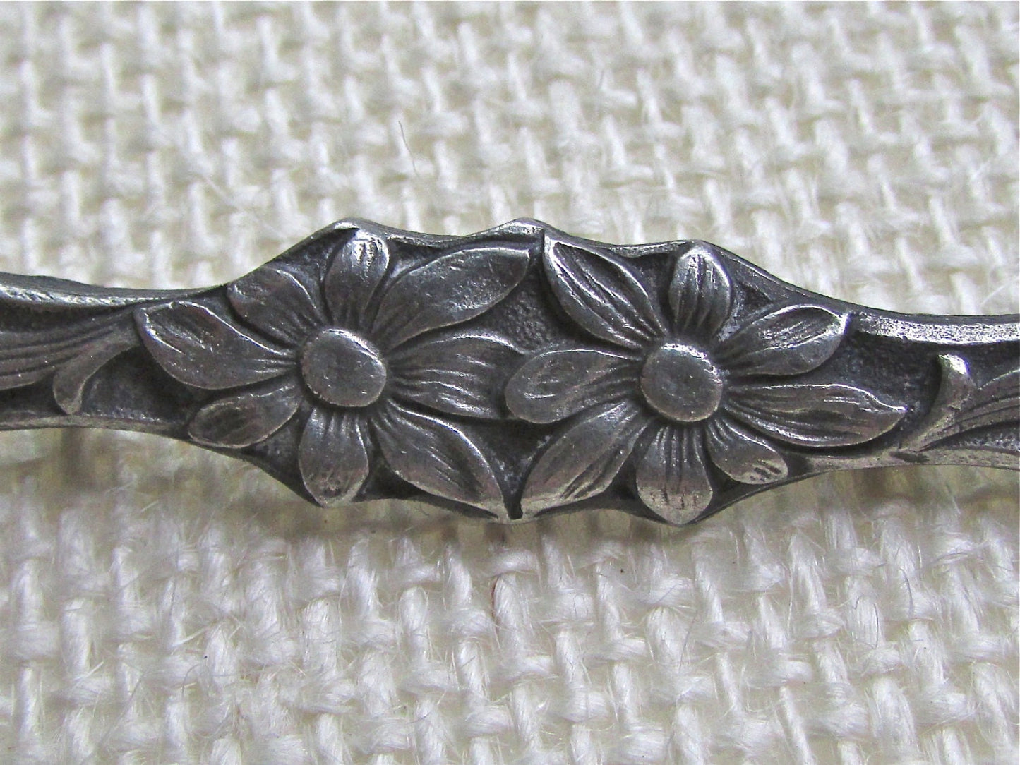 Intricately carved floral vintage bar pin