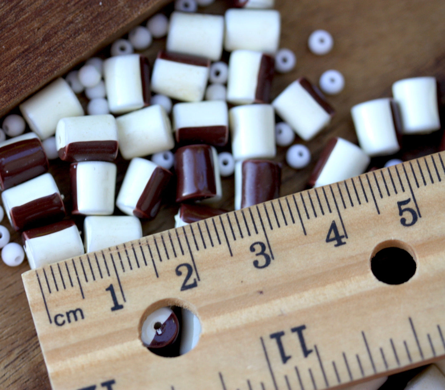 One dozen unique half brown, half creamy white vintage beads