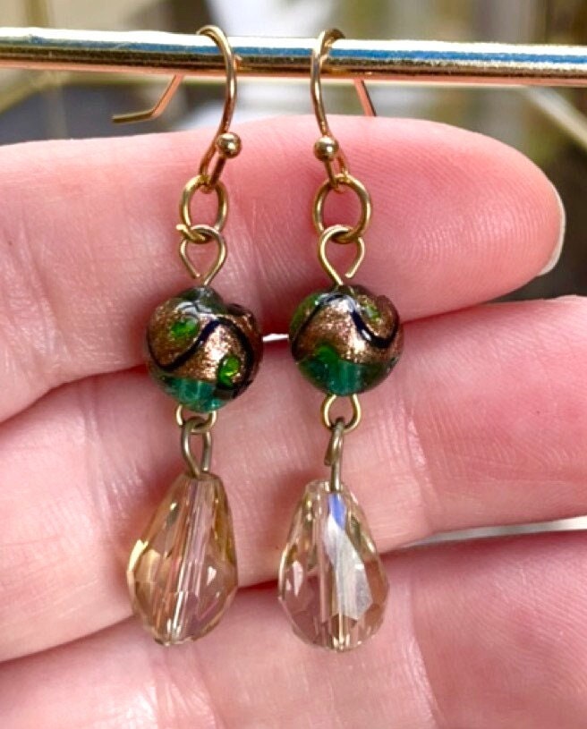 Handmade dangle earrings with green and gold art glass and faceted crystals