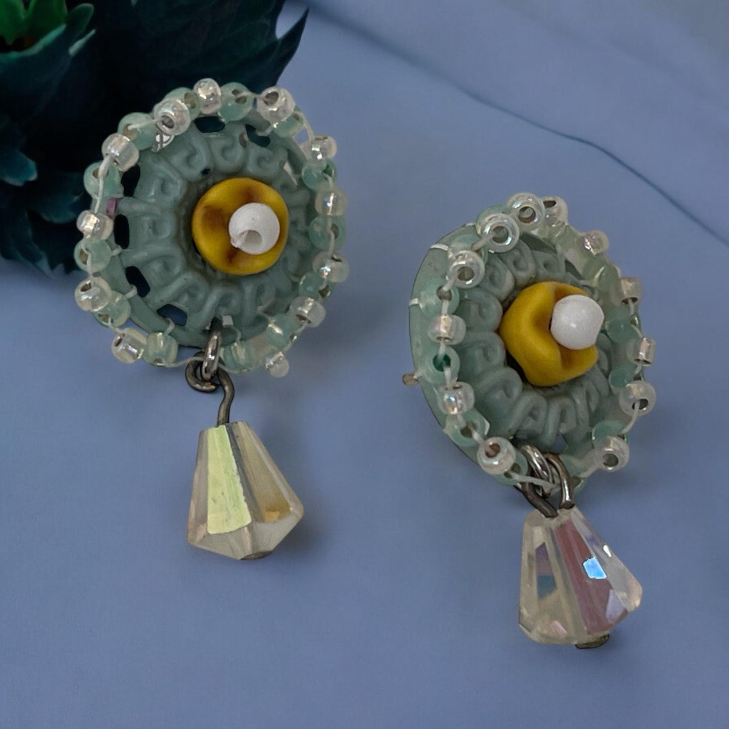 Stud earrings made of hand beaded vintage buttons with crystals