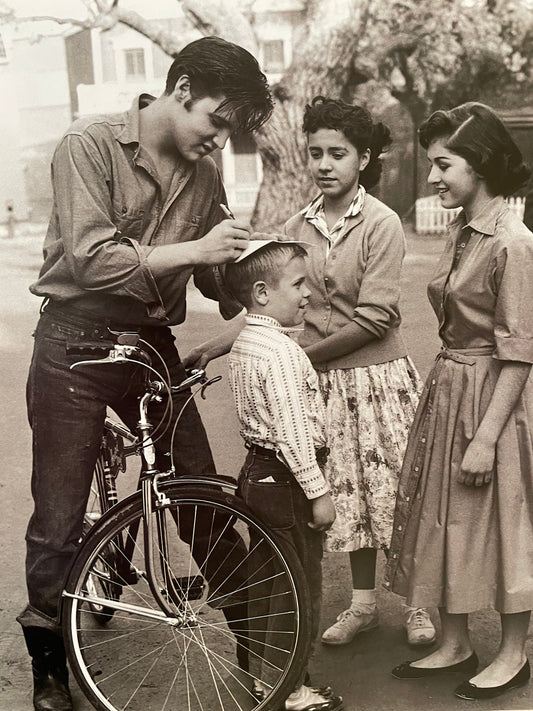 Legendary Rock 'N Roll - Elvis Presley signing autographs - print from vintage book - 12" x 10"