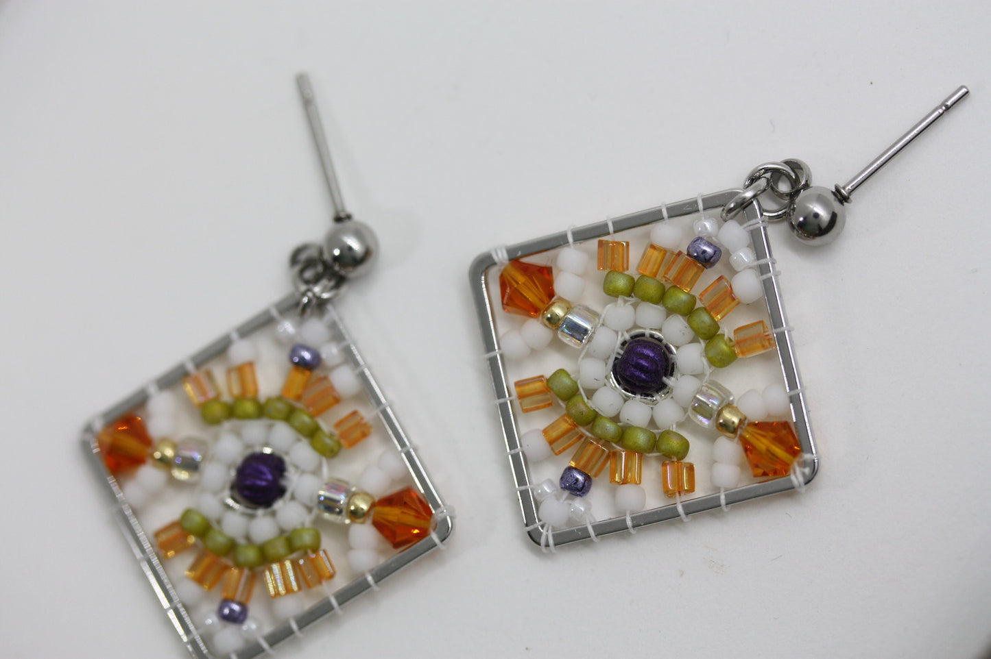 Orange, green, purple and white crystal and intricate beadwork small square dangle earrings