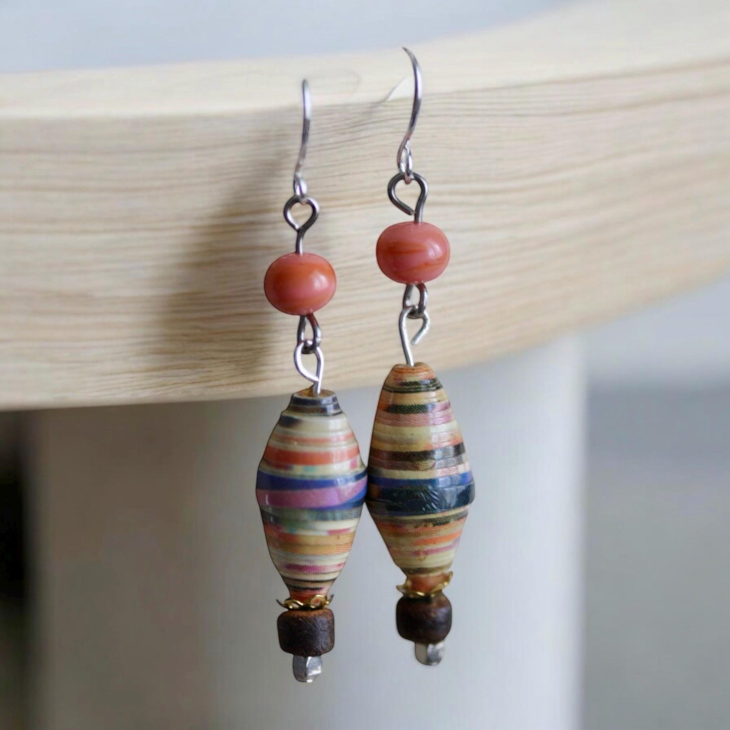 Oval rolled paper with coral glass - handmade dangle earrings - 2" long