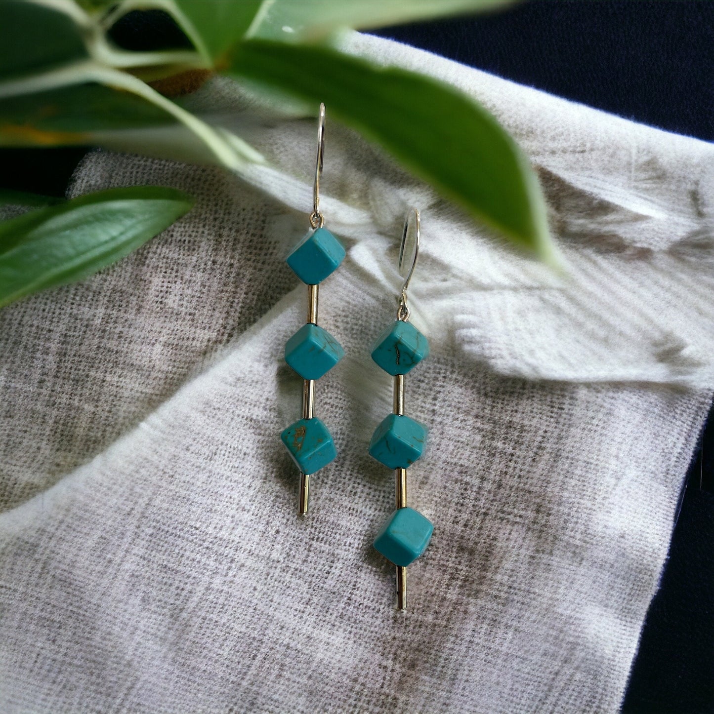 Three dimensional turquoise colored cube dangle earrings