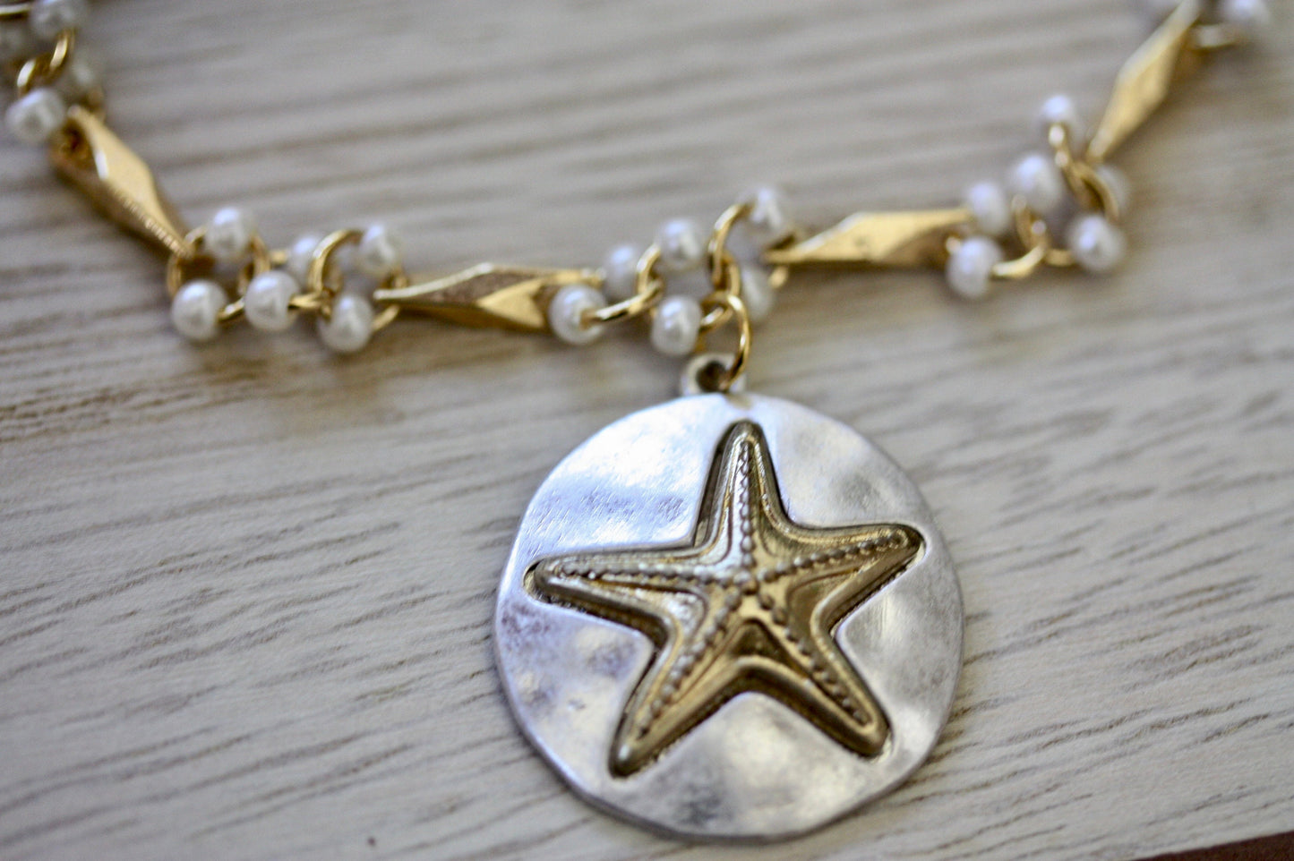 Handmade bracelet made with upcycled / repurposed vintage silver tone and gold tone starfish dangle, charm bracelet