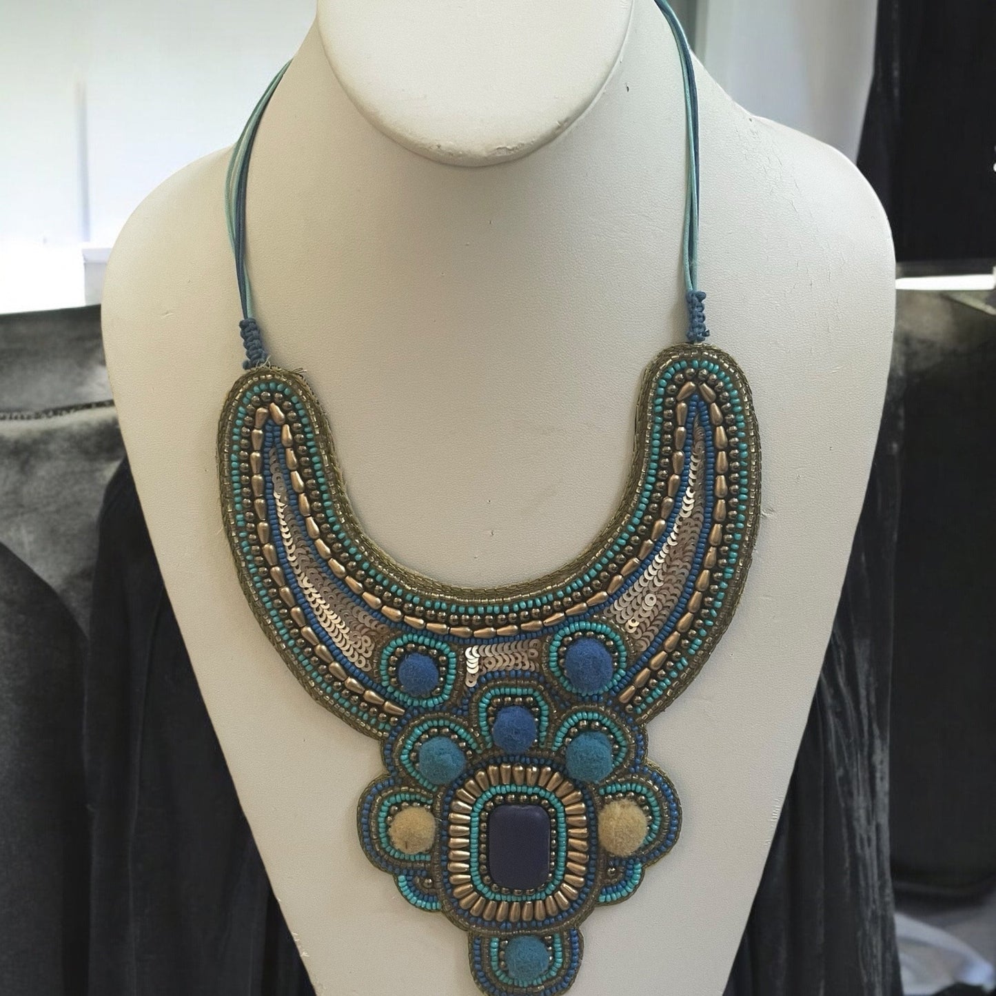 Stunning beadwork necklace - mixed materials with sequins, pom poms and beads - turquoise