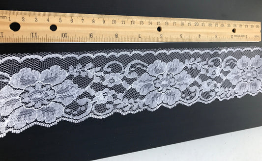 Wide (2 and one-half inches wide) vintage white lace - by the yard