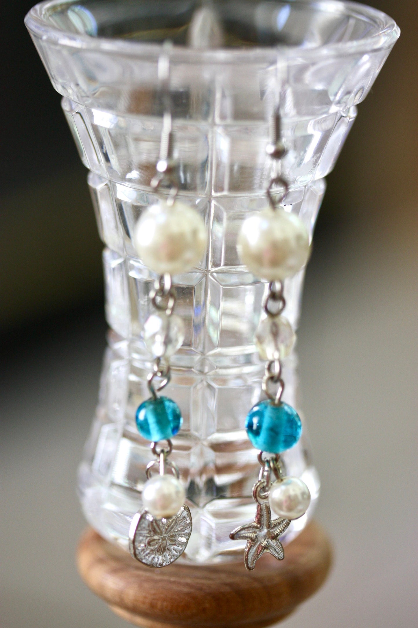Faux pearl, clear crystal and recovered blue vintage glass dangle earrings with starfish and silver dollar metal shell