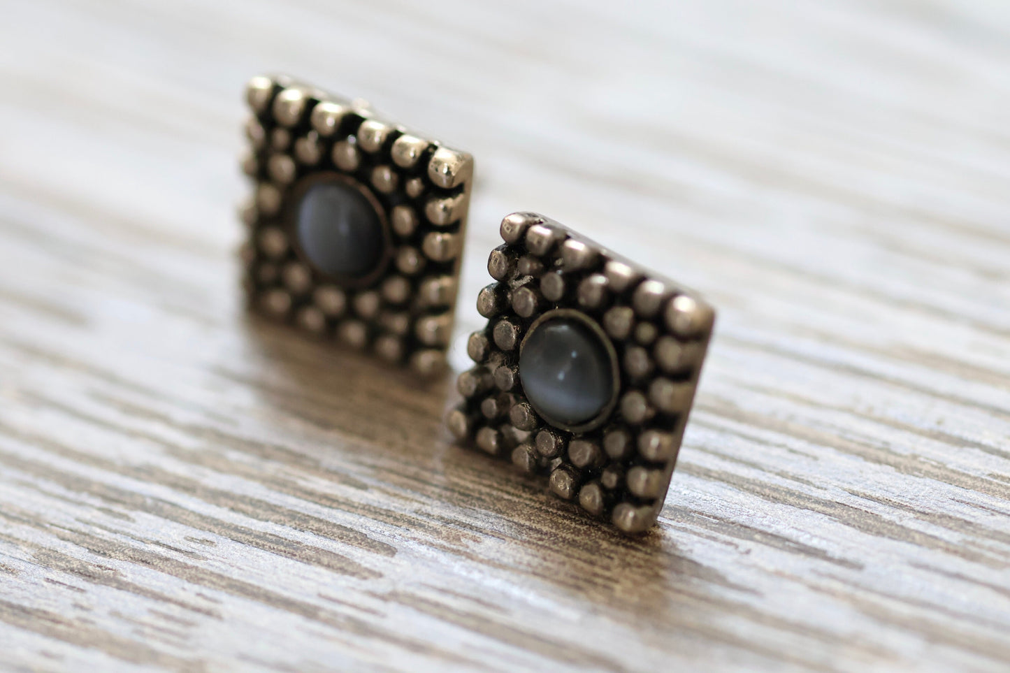Textured metal vintage square stud earrings with blue glass inlay