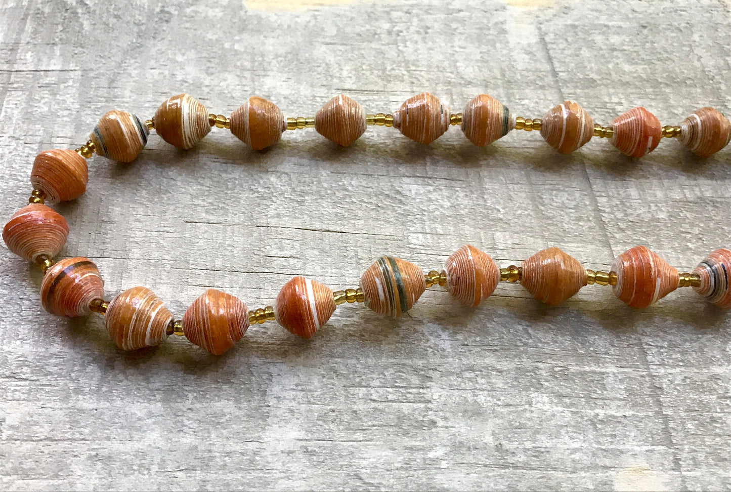 Unique orange vintage artisan necklace - beads look like porcelain but are actually made of rolled paper that's been painted & sealed
