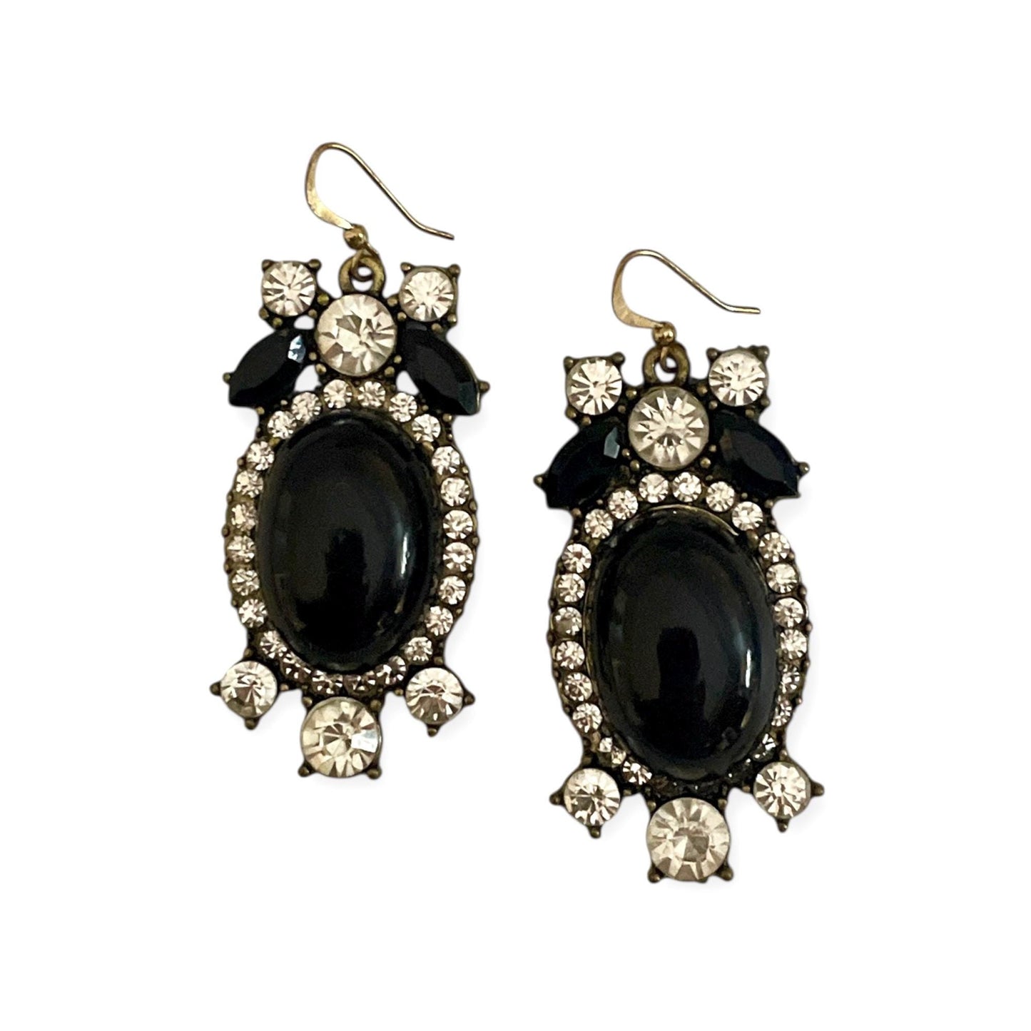 A pair of elegant earrings with black stones and sparkling rhinestones.