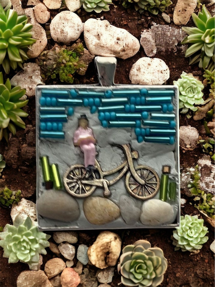 My own handmade micro mosaic mixed material collage necklace - woman resting on her bicycle