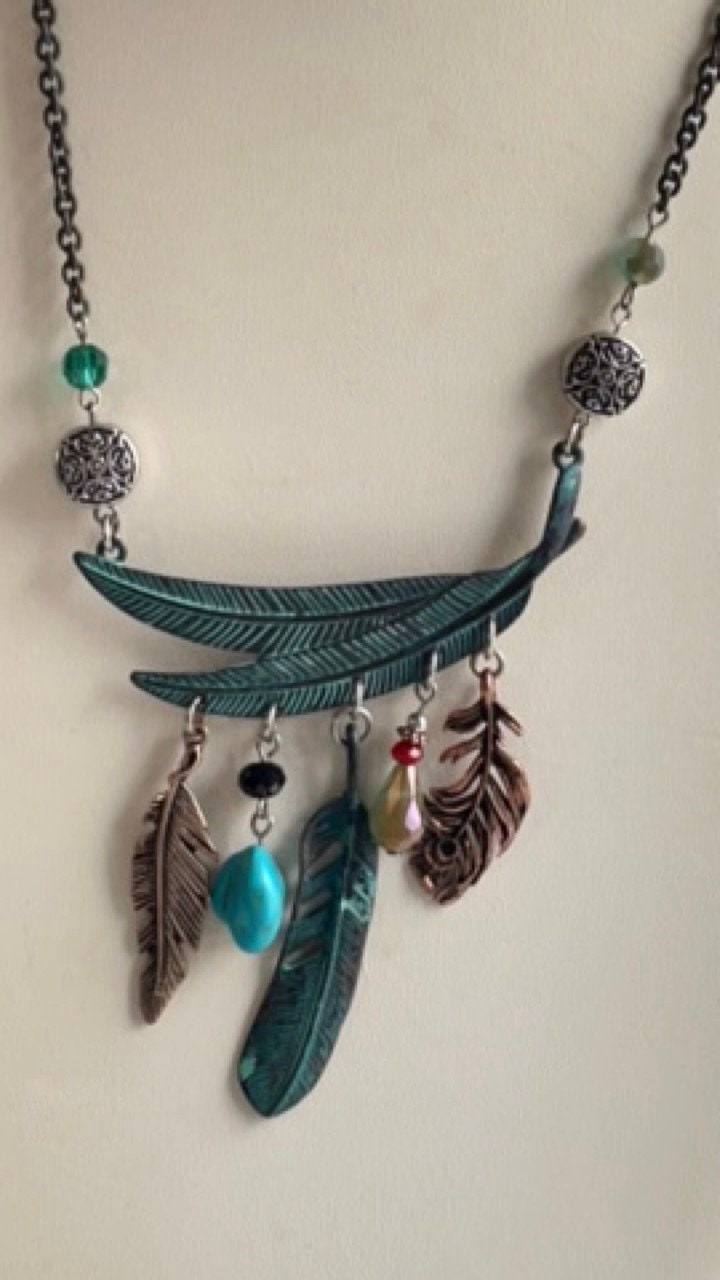 Mixed material feather and charm vintage artisan necklace